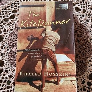 The Kite Runner. A softcover novel by Khaled Hosseini.